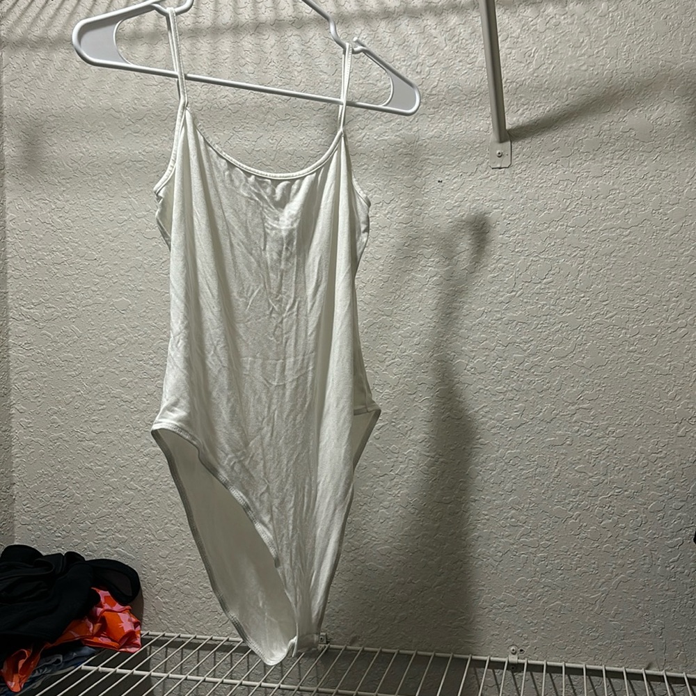 white bodysuit never been worn